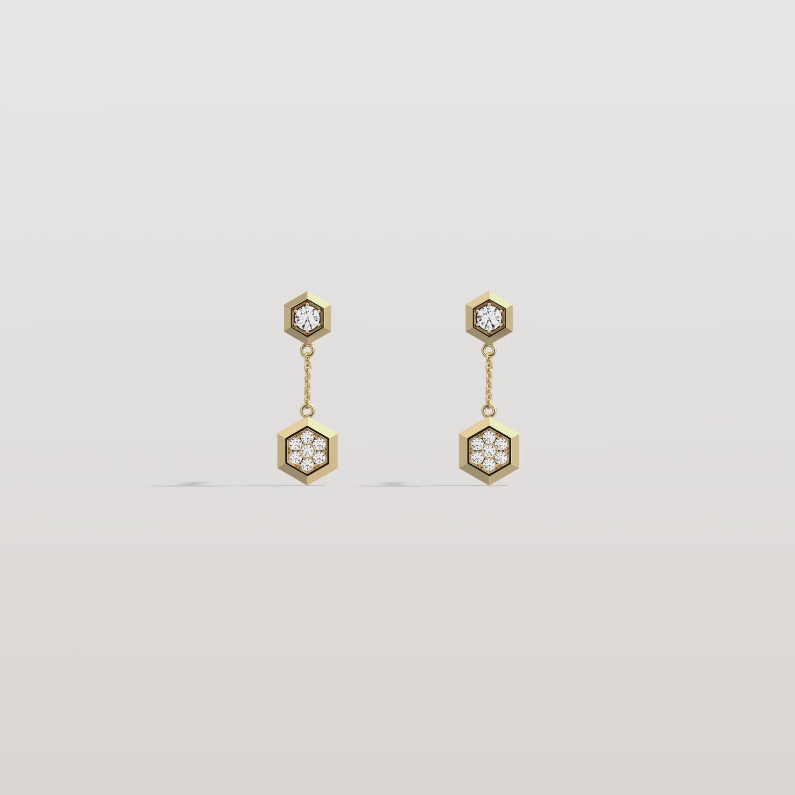 rendering video of a yellow gold Lab Dimaond Hexagon shaped Drop Earrings